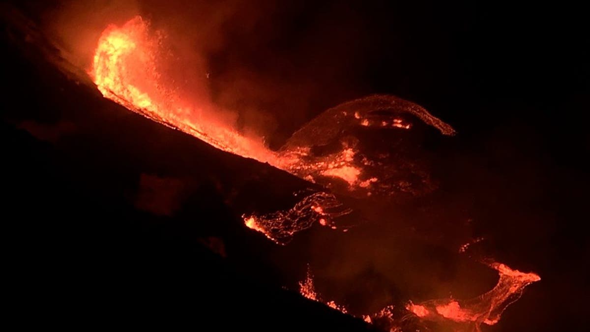 In this photo provided by the U.S. Geological Survey, lava flows within the Halema’uma’u crater of the Kilauea volcano Sunday, Dec. 20, 2020. The Kilauea volcano on Hawaii’s Big Island has erupted, the U.S. Geological Survey said. (U.S. Geological Survey via AP)