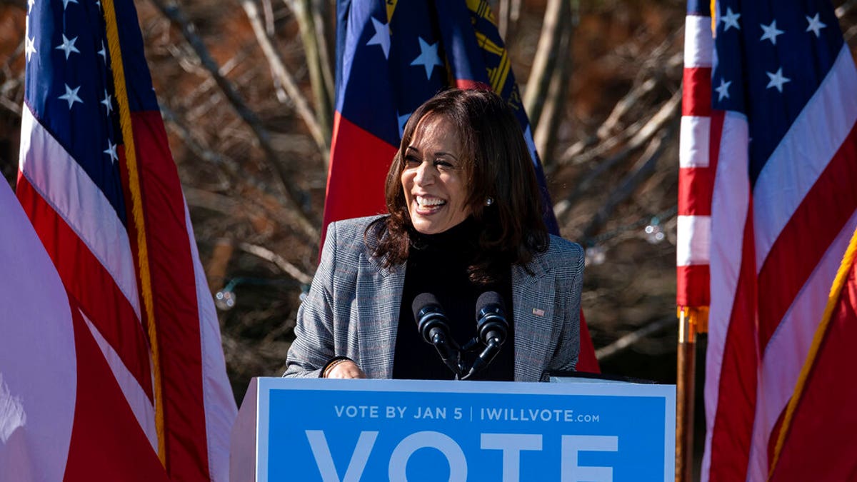 Vice President-Elect Kamala Harris campaigns for Democratic U.S. Senate challengers the Rev. Raphael Warnock and Jon Ossoff, Monday, Dec. 21, 2020, in Columbus, Ga. (AP Photo/Ben Gray)