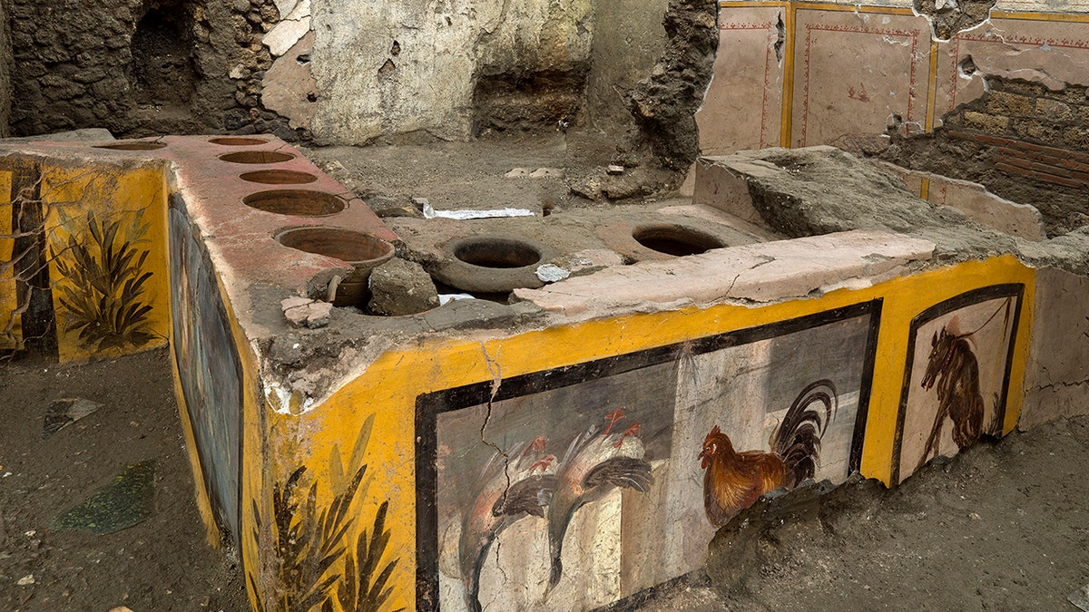 An undated photo made available by the Pompeii Archeological park press office shows the thermopolium in the Pompeii archeological park, near Naples, Italy. (Luigi Spina/Parco Archeologico di Pompei via AP)