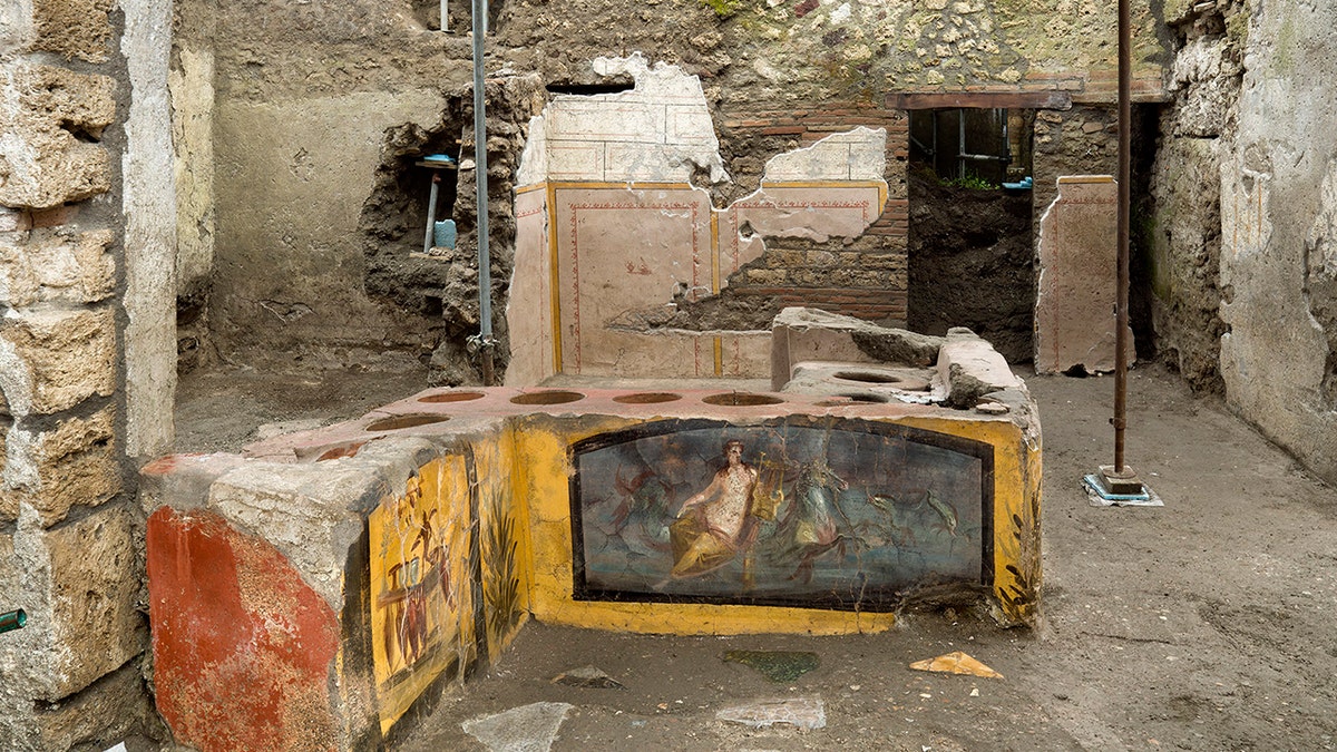 An undated photo made available by the Pompeii Archeological park press office shows the thermopolium in the Pompeii archeological park, near Naples, Italy. (Luigi Spina/Parco Archeologico di Pompei via AP)