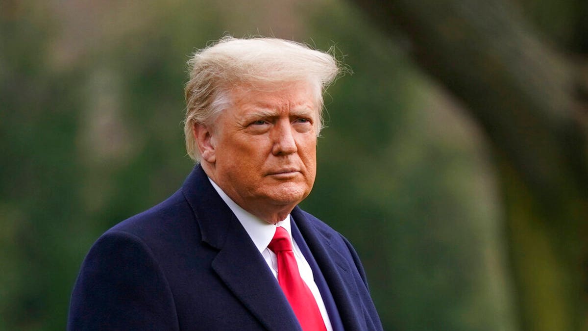 In this Dec. 12, 2020, file photo President Donald Trump walks on the South Lawn of the White House in Washington before boarding Marine One. (AP Photo/Patrick Semansky, File)