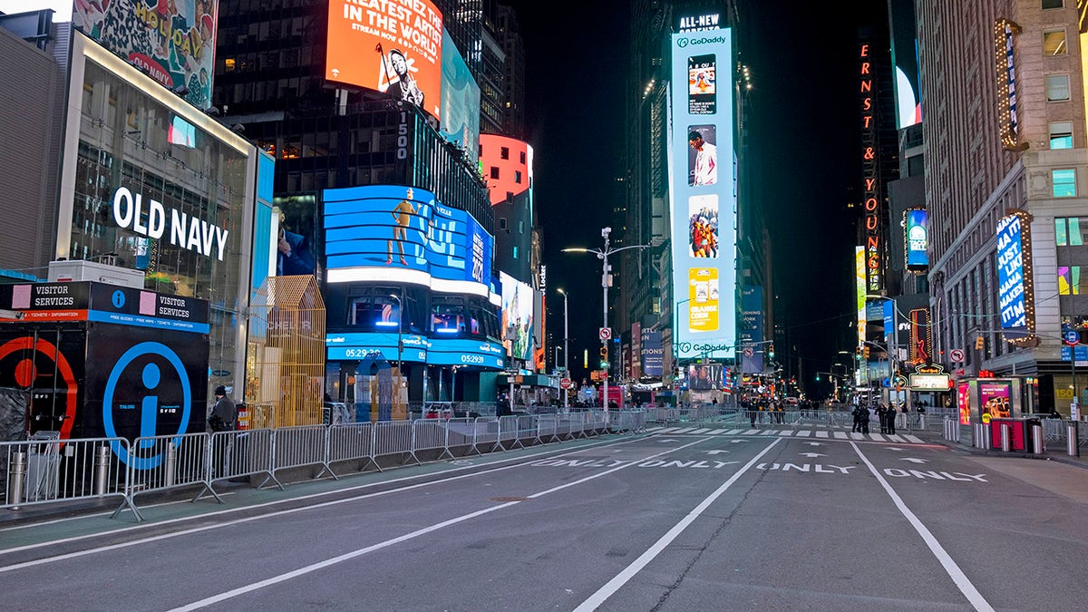 Seventh Avenue in New York City was mostly empty during what would normally be a Times Square packed with people, late Thursday, Dec. 31, 2020, as celebrations have been truncated this New Year's Eve due to the ongoing pandemic. (Associated Press)