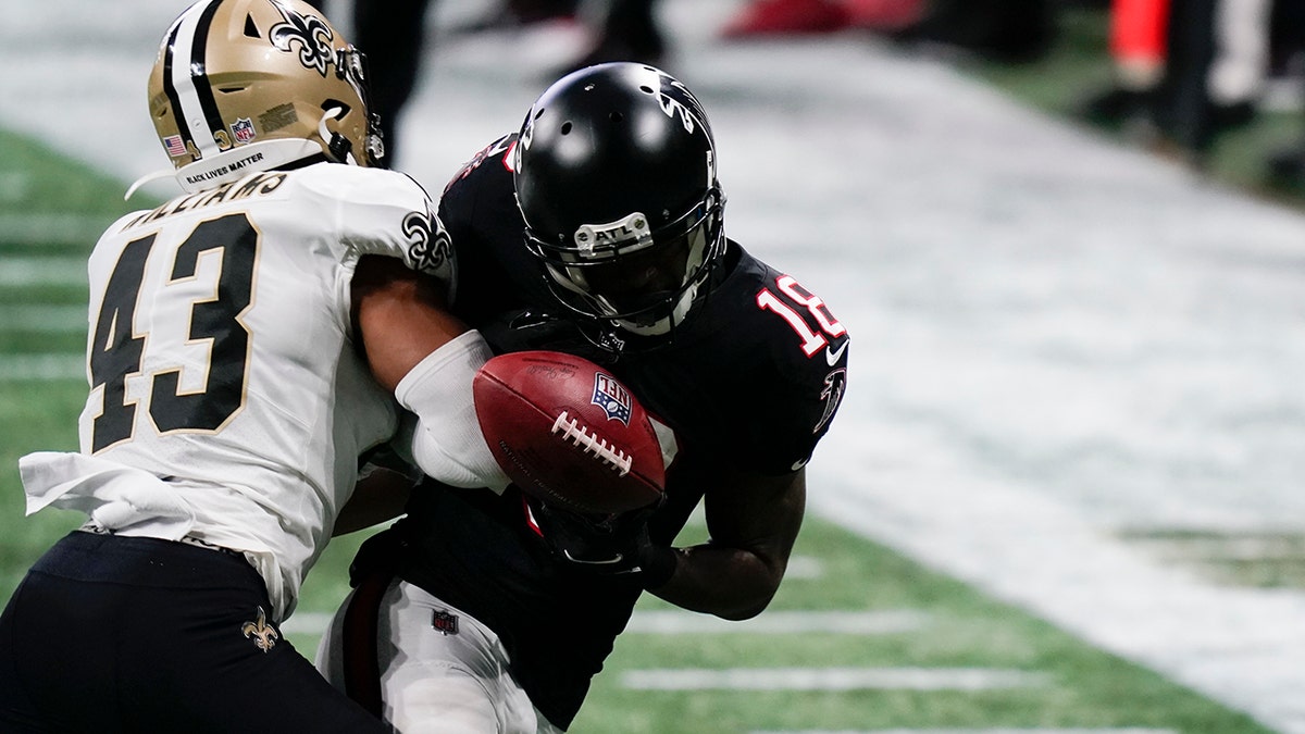 New Orleans Saints free safety Marcus Williams (43) hits Atlanta Falcons wide receiver Calvin Ridley (18) during the second half of an NFL football game, Sunday, Dec. 6, 2020, in Atlanta.