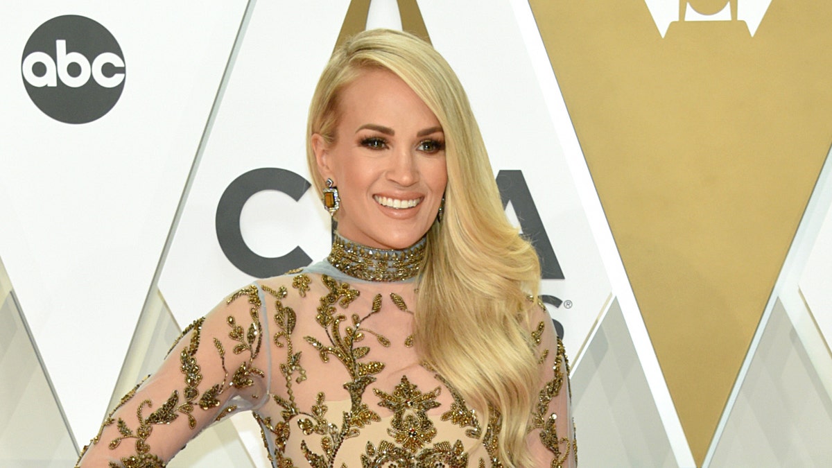 Carrie Underwood has a no-nonsense approach to staying healthy while on the road.