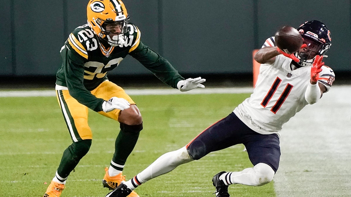 Chicago Bears' Darnell Mooney can't catch a pass in front of Green Bay Packers' Jaire Alexander during the second half of an NFL football game Sunday, Nov. 29, 2020, in Green Bay, Wis. The Packers won 41-25. (AP Photo/Morry Gash)