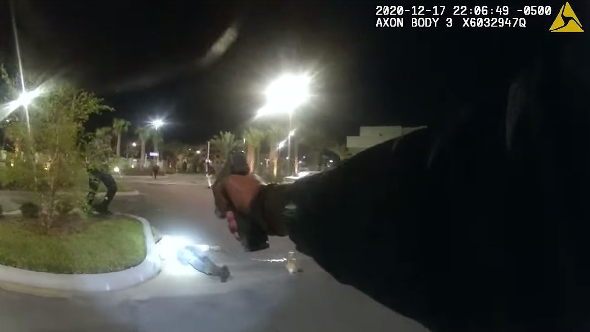 Screen image from video showing Andrew Mansilla, 25, on the ground after being shot by Daytona Beach police officers.