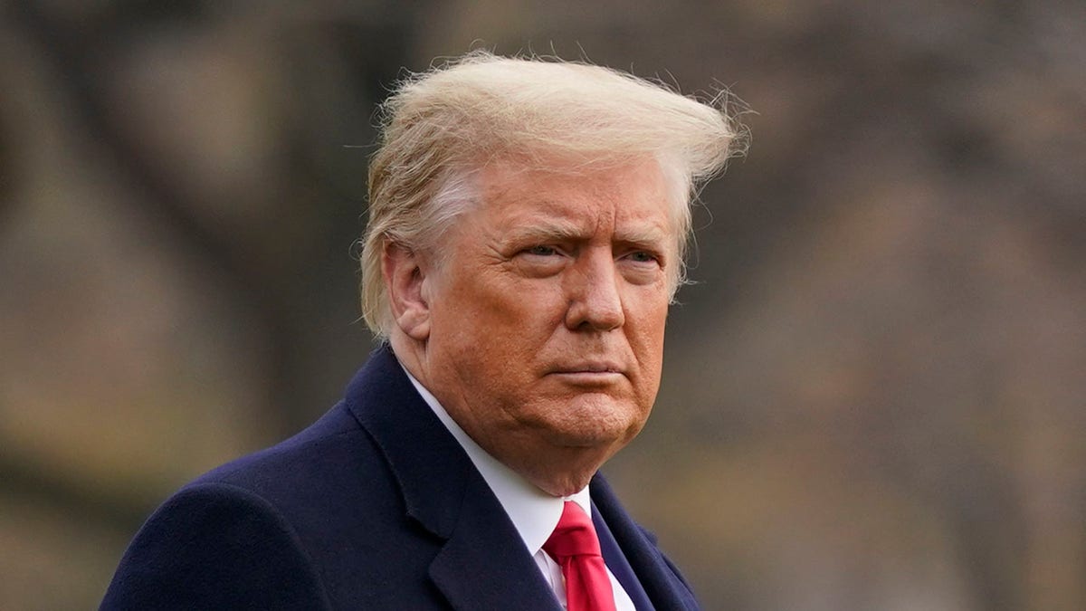 In this Dec. 12, 2020, file photo, President Trump walks on the South Lawn of the White House in Washington before boarding Marine One. Trump has yet to concede the presidential election. (AP Photo/Patrick Semansky)