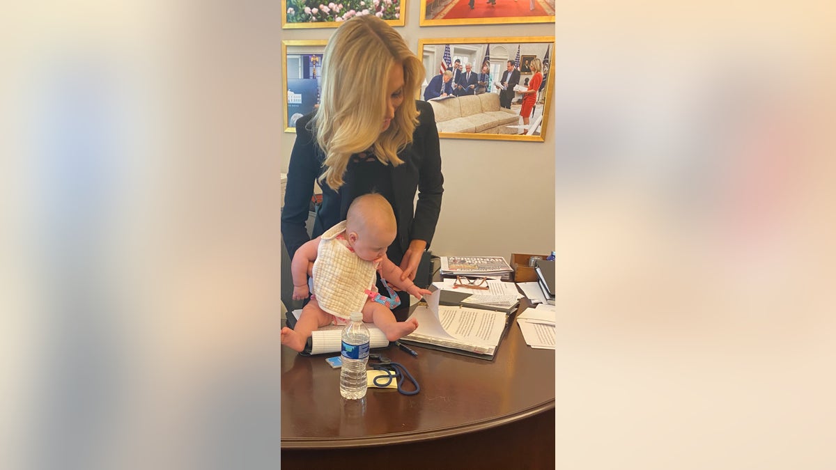 McEnany and her daughter, Blake, in her office at the White House.