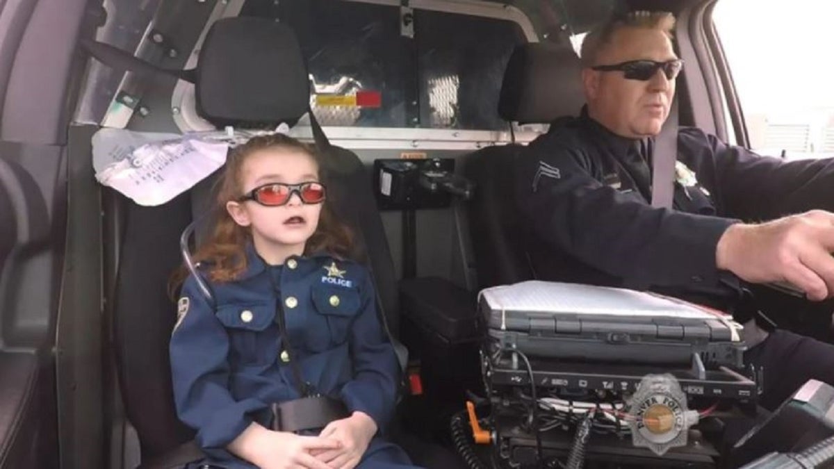 Media coverage showed 7-year-old Olivia Gant fulfilling a bucket list that included being a cop for a day.