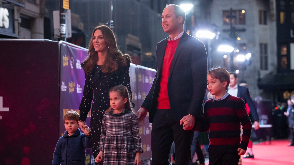 Prince William, Duke of Cambridge and Catherine, Duchess of Cambridge with their children, Prince Louis, Princess Charlotte and Prince George. The family attended a special pantomime performance at London's Palladium Theatre. (Photo by Aaron Chown - WPA Pool/Getty Images)