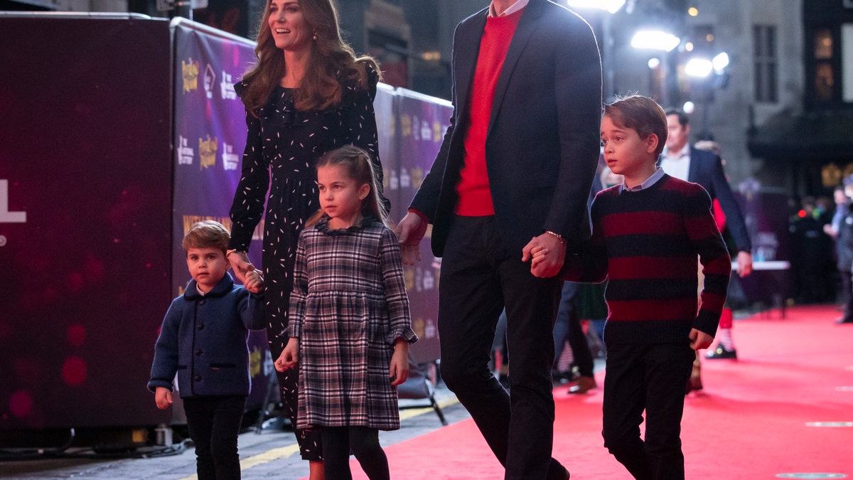 Prince William, Duke of Cambridge and Catherine, Duchess of Cambridge with their children, Prince Louis, Princess Charlotte and Prince George. The family attended a special pantomime performance at London's Palladium Theatre. (Photo by Aaron Chown - WPA Pool/Getty Images)