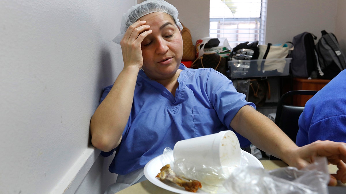 FILE -- Houston, Texas, Dec. 9, 2020: When nurse Flor Treviño left the Covid-19 unit at Houston's United Memorial Medical Center for a quick break Dec. 8 she started to feel the fatigue from her fourth day of 12-hour shifts. (Carolyn Cole / Los Angeles Times via Getty Images)