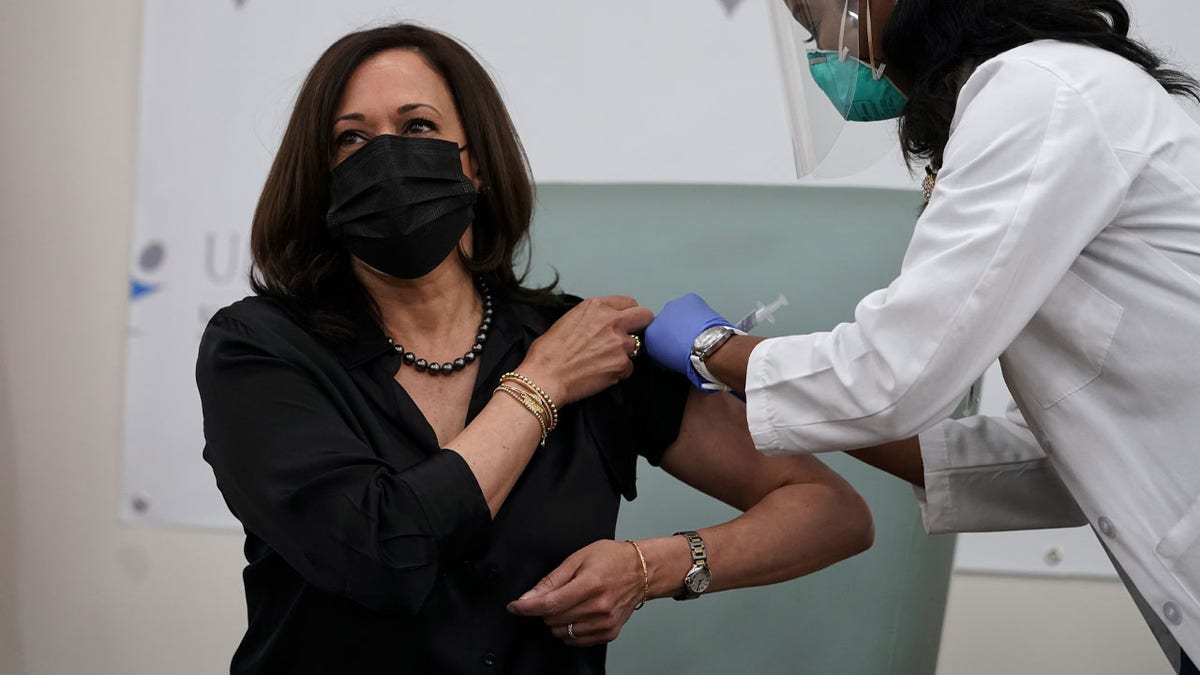 Vice President-elect Kamala Harris receives the Moderna COVID-19 vaccine from nurse Patricia Cummings, Tuesday Dec. 29, 2020, at United Medical Center in southeast Washington. (AP Photo/Jacquelyn Martin)