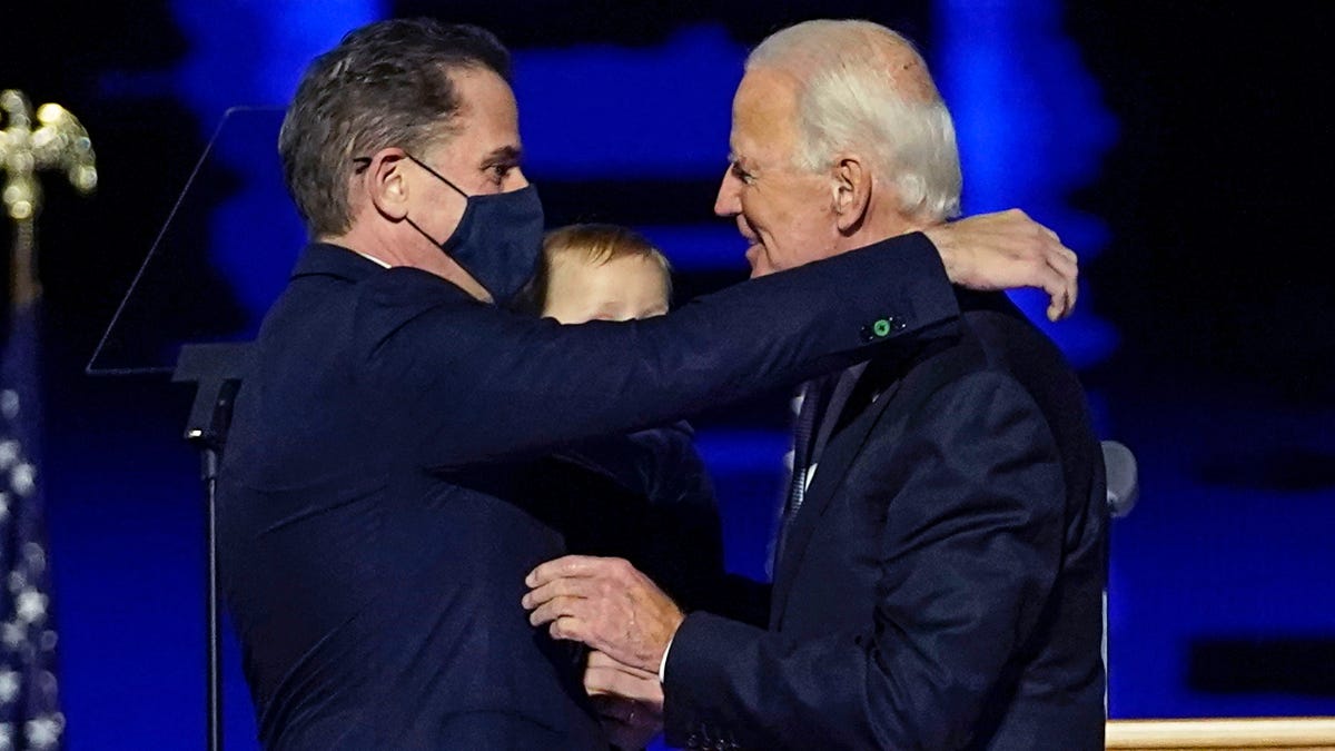 President-elect Joe Biden embraces his son Hunter Biden, in Wilmington