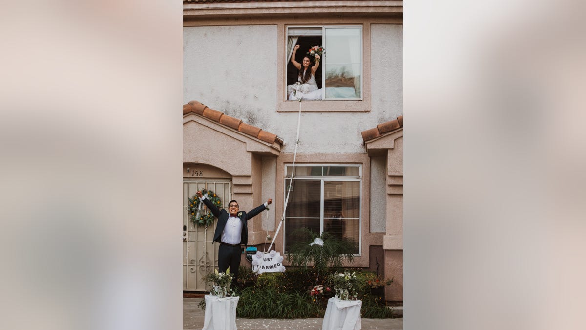 Lauren and Patrick Delgado were married last month at Lauren’s family home in Ontario, California, while she quarantined on the second floor.