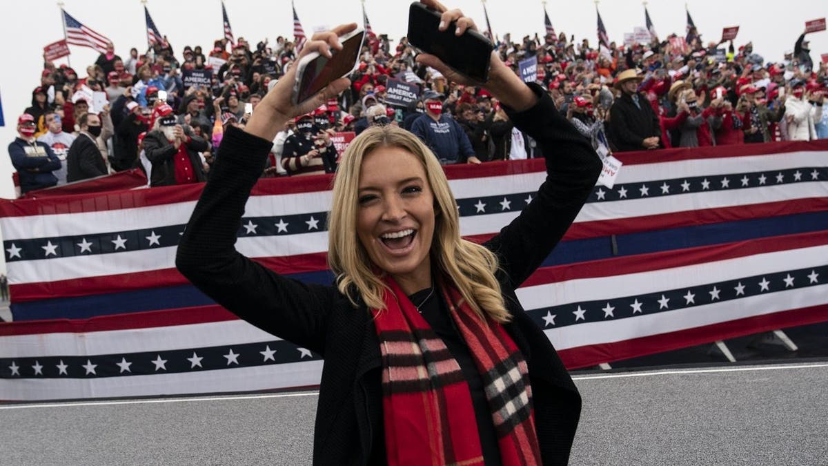 White House press secretary Kayleigh McEnany dances to "YMCA," after President Donald Trump spoke at a campaign rally at Lancaster Airport on Oct. 26, 2020, in Lititz, Pennsylvania. (AP Photo/Alex Brandon)