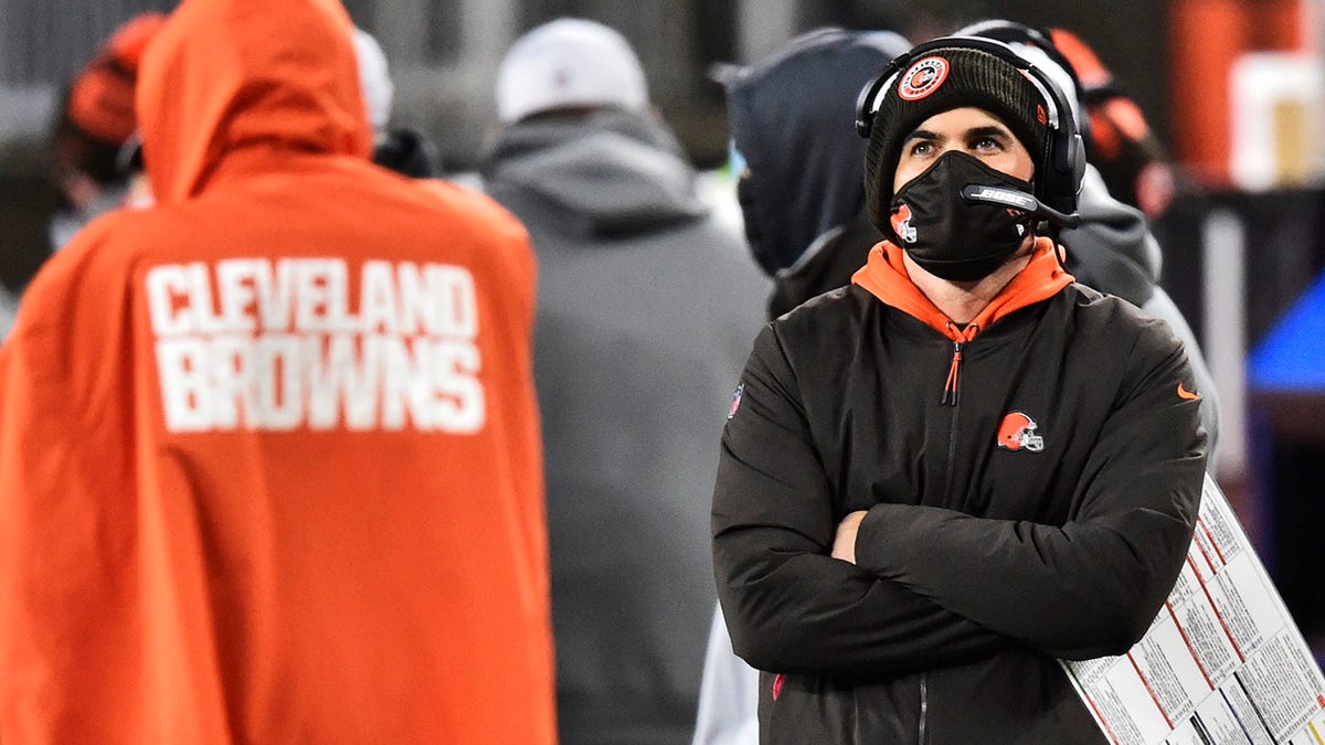 Cleveland Browns head coach Kevin Stefanski watches late during the second half of an NFL football game against the Baltimore Ravens, Monday, Dec. 14, 2020, in Cleveland. The Ravens won 47-42. (AP Photo/David Richard)