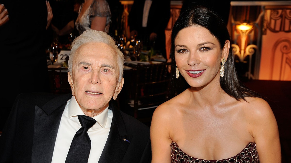 Kirk Douglas with his daughter-in-law Catherine Zeta-Jones. (Photo by Frazer Harrison/Getty Images for AFI)