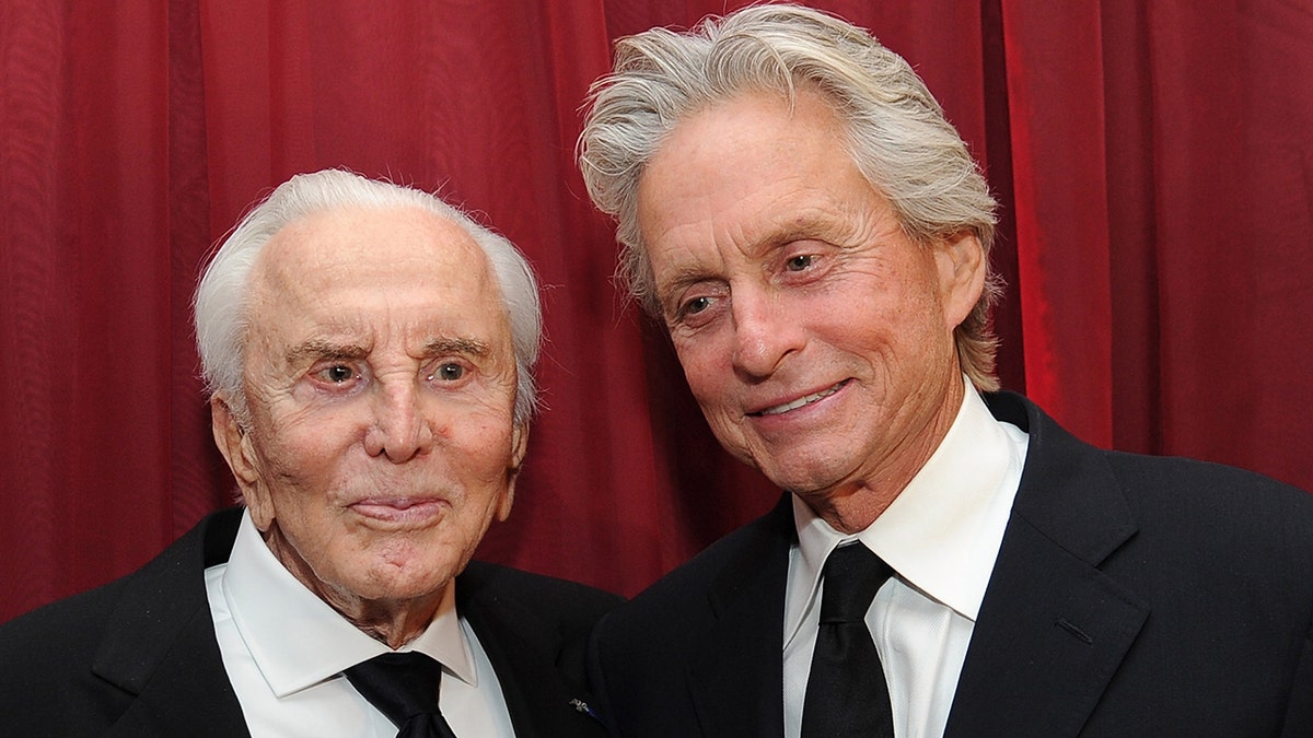 Kirk Douglas (left) and his son Michael Douglas (right). Kirk died at 103 earlier this year. (Photo by Michael Buckner/Getty Images)