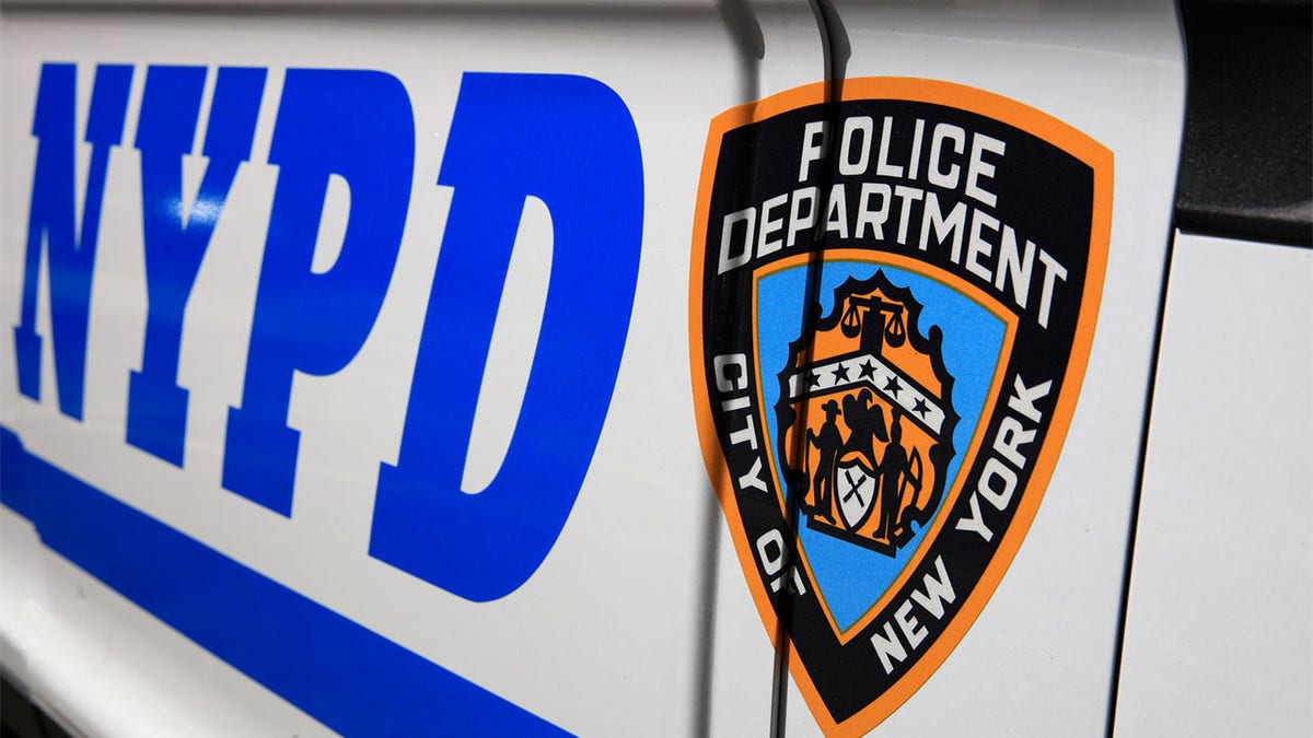 photo shows close up view of signage on NYPD vehicle