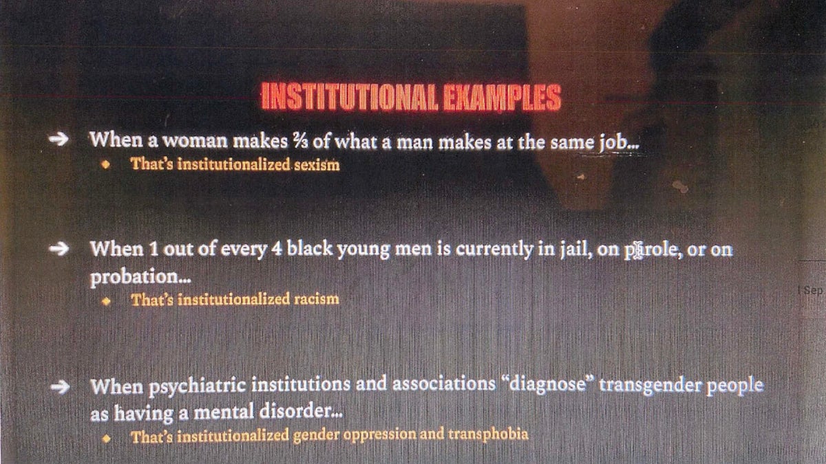 Democracy Prep class slide purporting to show examples of institutional oppression.