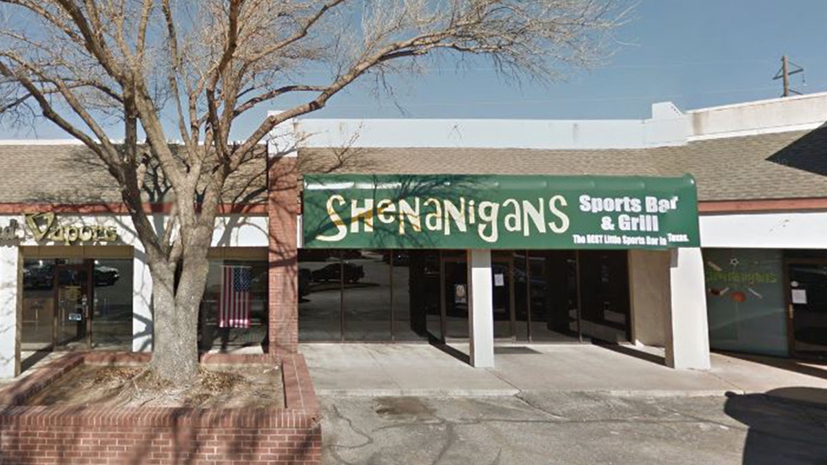 "We wanted to bless someone for Christmas," Rodney Fleming, a former San Angelo City Councilman, told server Ashley Farmer at Shenanigan's Sports Bar, pictured.