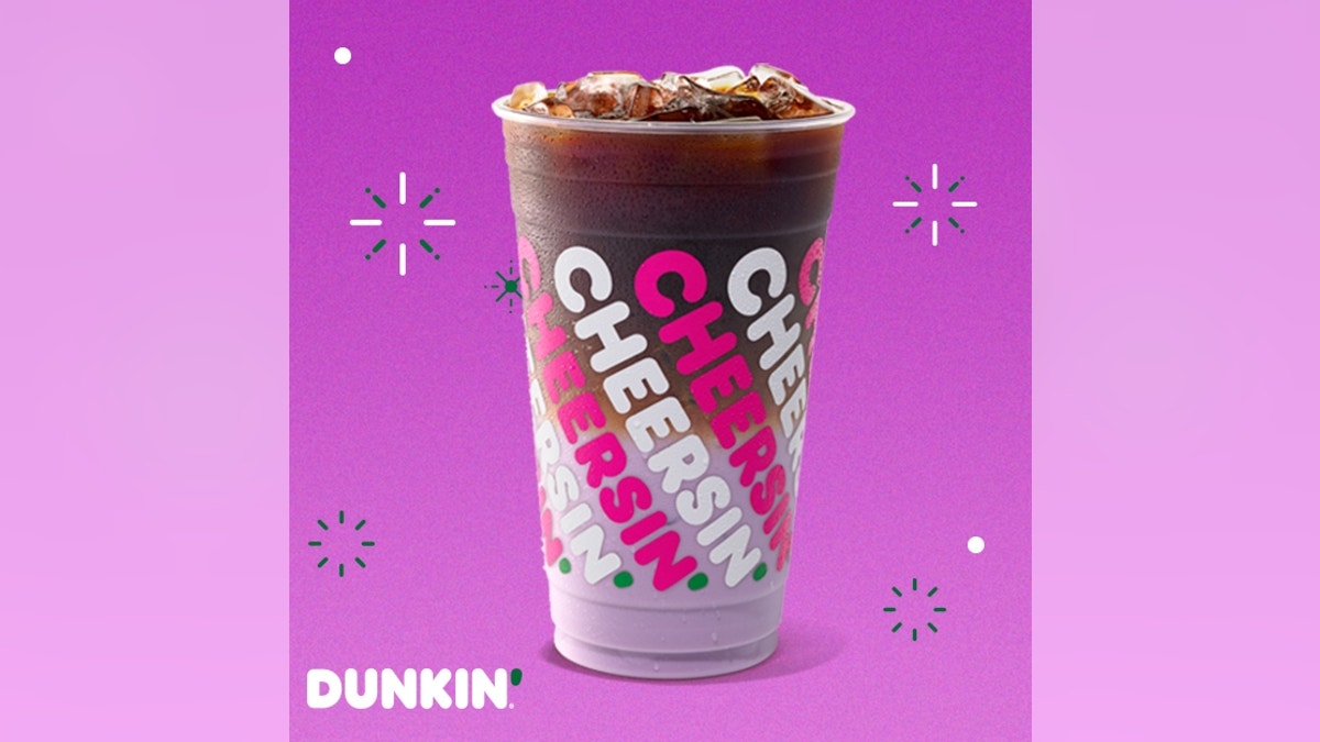 Dunkin' has released a new, purple holiday drink called the Sugarplum Macchiato. 