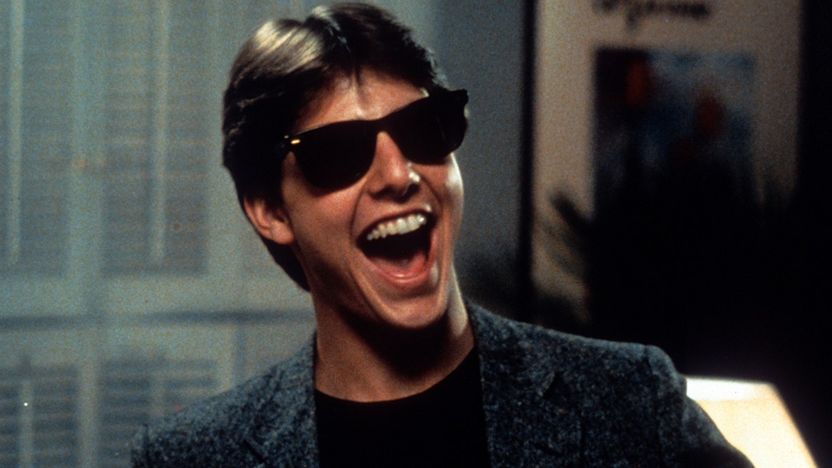 Tom Cruise laughs in a scene from the film 'Risky Business', 1983. (Getty Images)