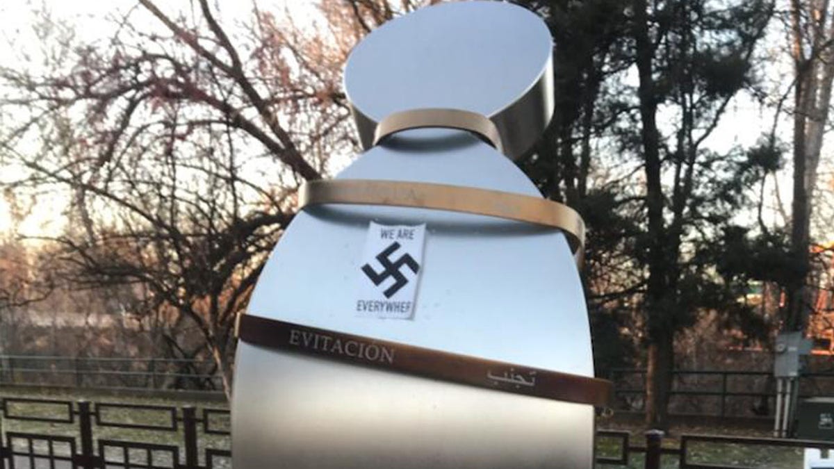 A swastika sticker seen on a sculpture at the Idaho Anne Frank Human Rights Memorial in Boise, Idaho, on Tuesday, Dec. 8, 2020.  (Wassmuth Center for Human Rights via AP)