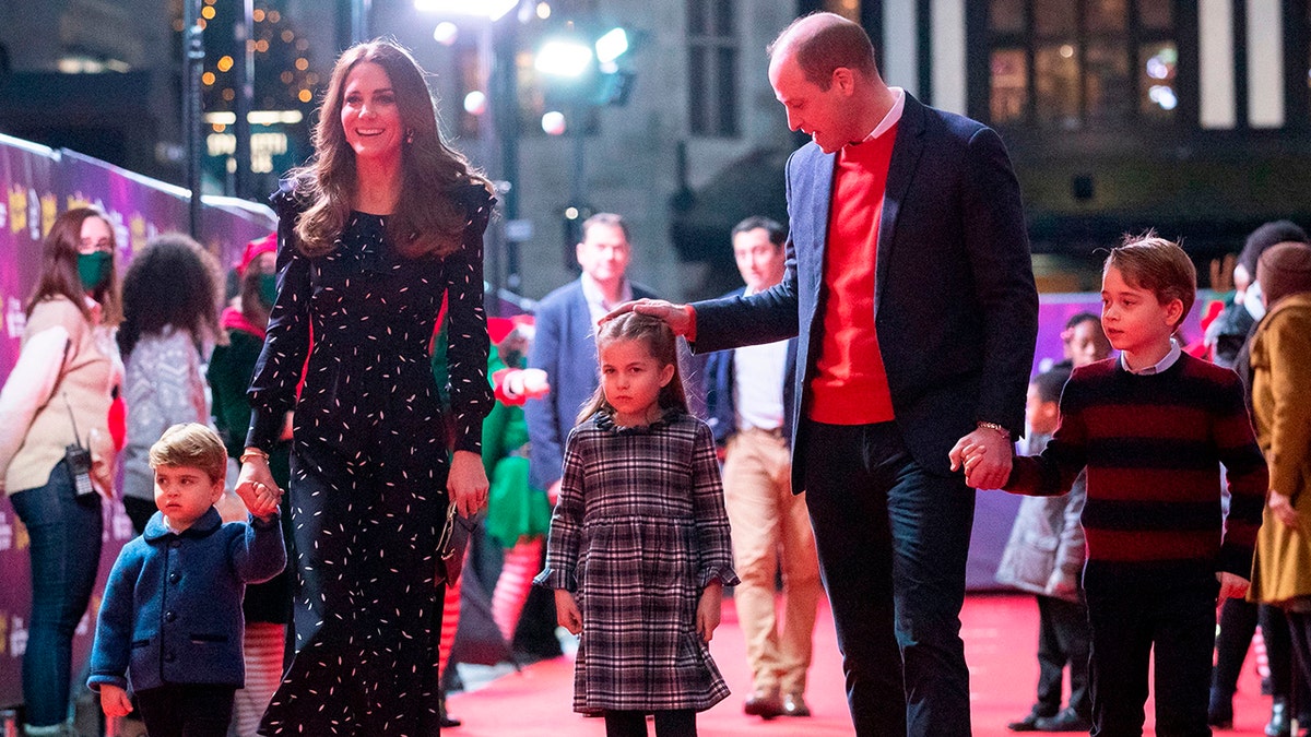 Prince William, Kate Middleton, and their children George, Charlotte and Louis. (Photo by Aaron Chown / POOL / AFP) (Photo by AARON CHOWN/POOL/AFP via Getty Images)