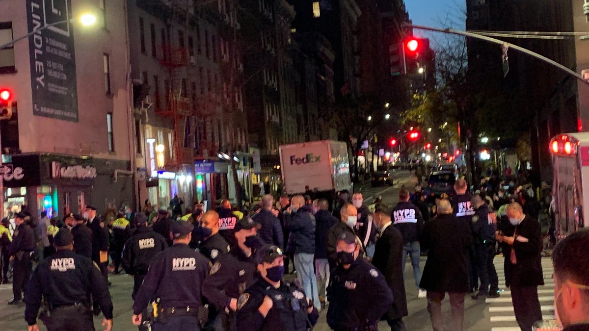 A car plowed into a group of protesters, injuring six, on Dec. 11, in the Murray Hill neighborhood of New York City.