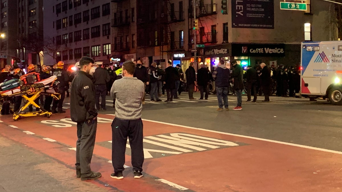 A car plowed into a group of protesters, injuring several, on Dec. 11, in the Murray Hill neighborhood of New York City.