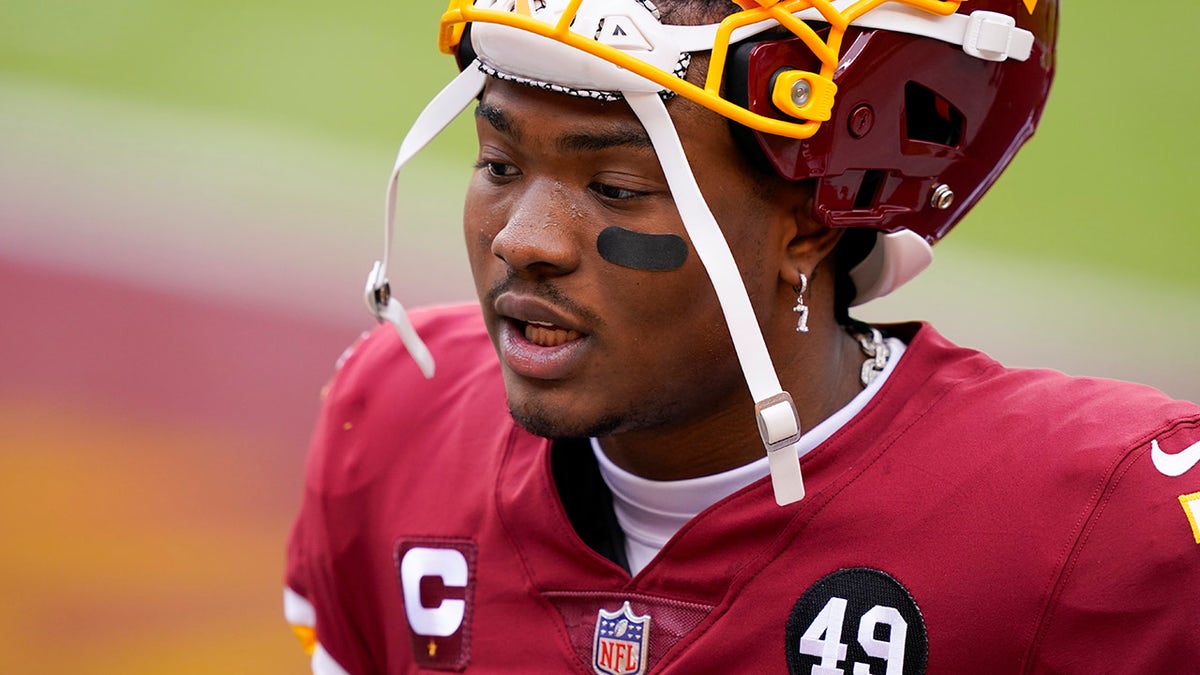 Washington Football Team quarterback Dwayne Haskins (7) before the start of an NFL football game against the Seattle Seahawks, Sunday, Dec. 20, 2020, in Landover, Md.