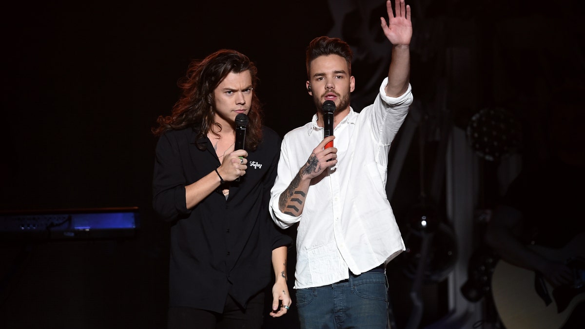 Harry Styles (L) and Liam Payne (R) of One Direction