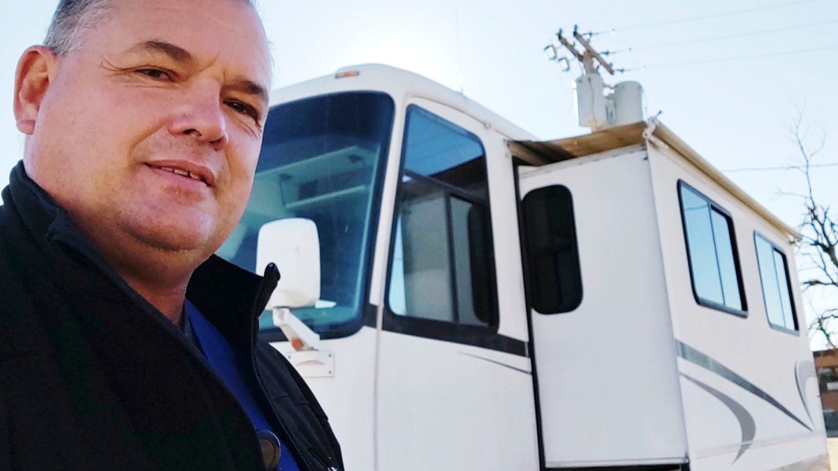 Lewallen, a radiology technician has been sleeping in an RV in the parking lot of his rural Kansas hospital because his co-workers are out sick with COVID-19 and no one else is available to take X-rays.