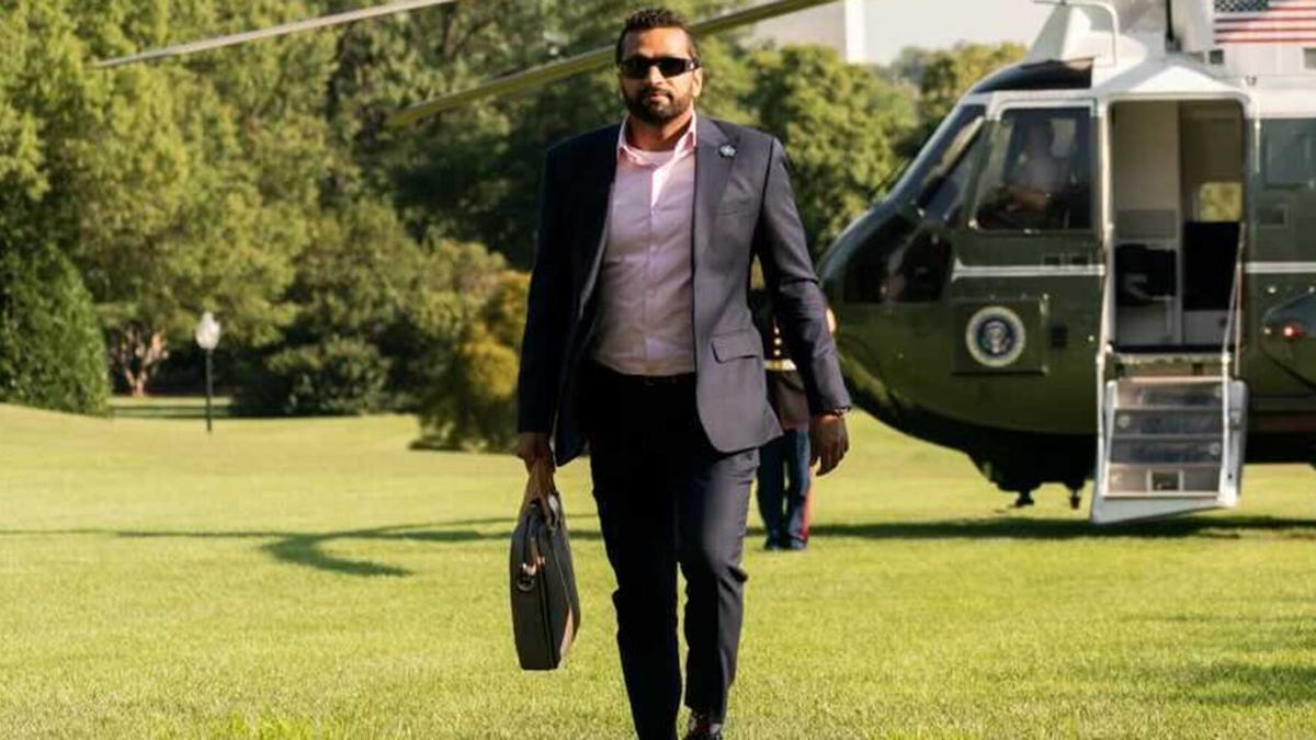 Patel pictured getting off Marine One during Trump's first term