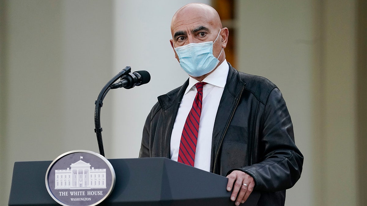 Dr. Moncef Slaoui, chief adviser to Operation Warp Speed, speaks in the Rose Garden of the White House, Friday, Nov. 13, 2020, in Washington. (AP Photo/Evan Vucci)
