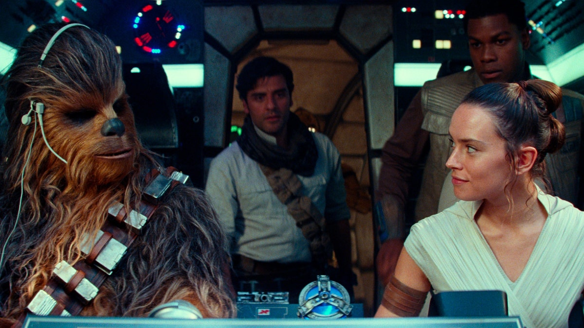 From left, Joonas Suotamo as Chewbacca, Oscar Isaac as Poe Dameron, Daisy Ridley as Rey and John Boyega as Finn in a scene from "Star Wars: The Rise of Skywalker." 