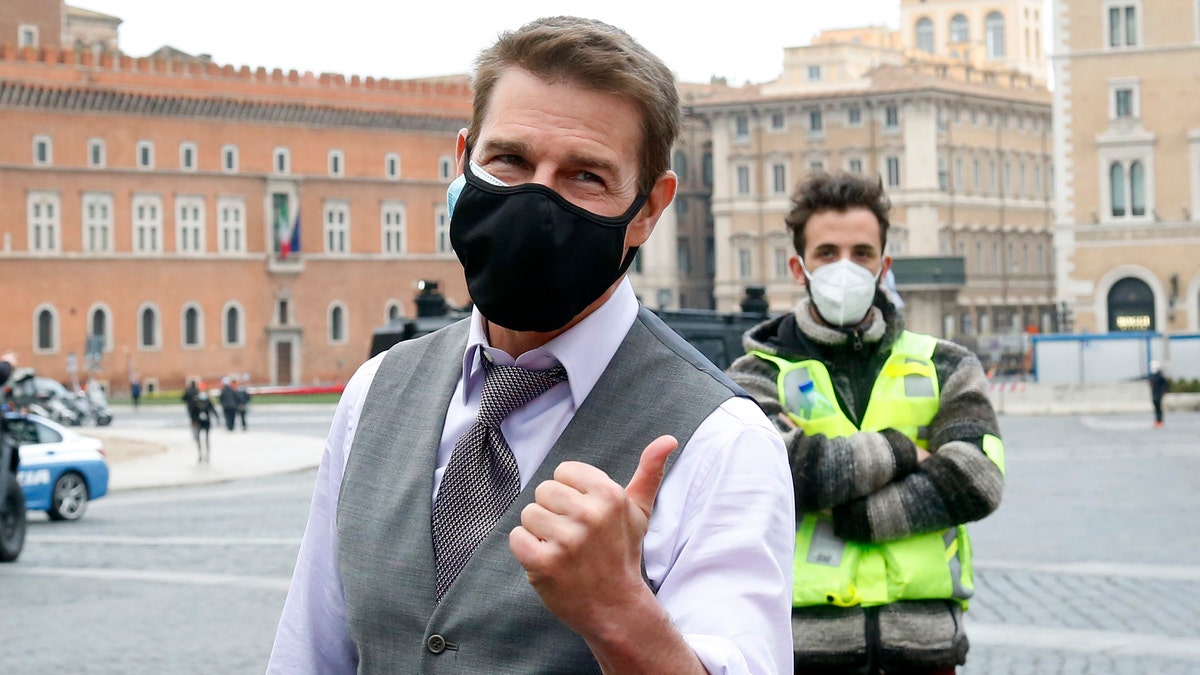 Actor Tom Cruise taking a selfie with his fans during a pause on the set of the film 'Mission: Impossible 7' in Piazza Venezia, just in front of the Victor Emmanuel II Monument (Tomb of the Unknown Soldier). Rome (Italy), November 29, 2020.