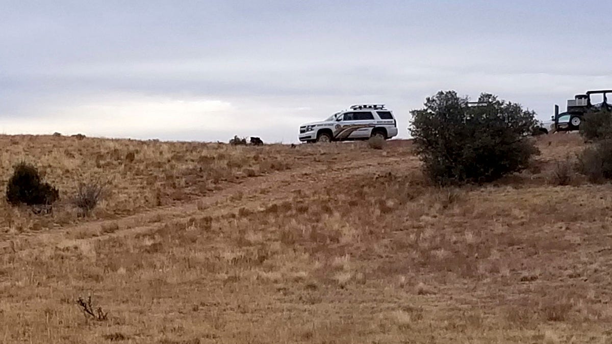 Authorities investigate the discovery of dozens of human body parts northwest of Prescott on Sunday. (Yavapai County Sheriff's Office via AP)