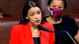 FILE - In this July 23, 2020, file image from video, Rep. Alexandria Ocasio-Cortez, D-N.Y., speaks on the House floor on Capitol Hill in Washington. Ocasio-Cortez raised $240 thousand for six organizations that provide services in her New York City congressional district over the weekend of Nov. 28, 2020, with most of it coming in during a 5-hour livestream when she was playing an online game. (House Television via AP, File)