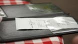 Restaurant check on patterned cloth