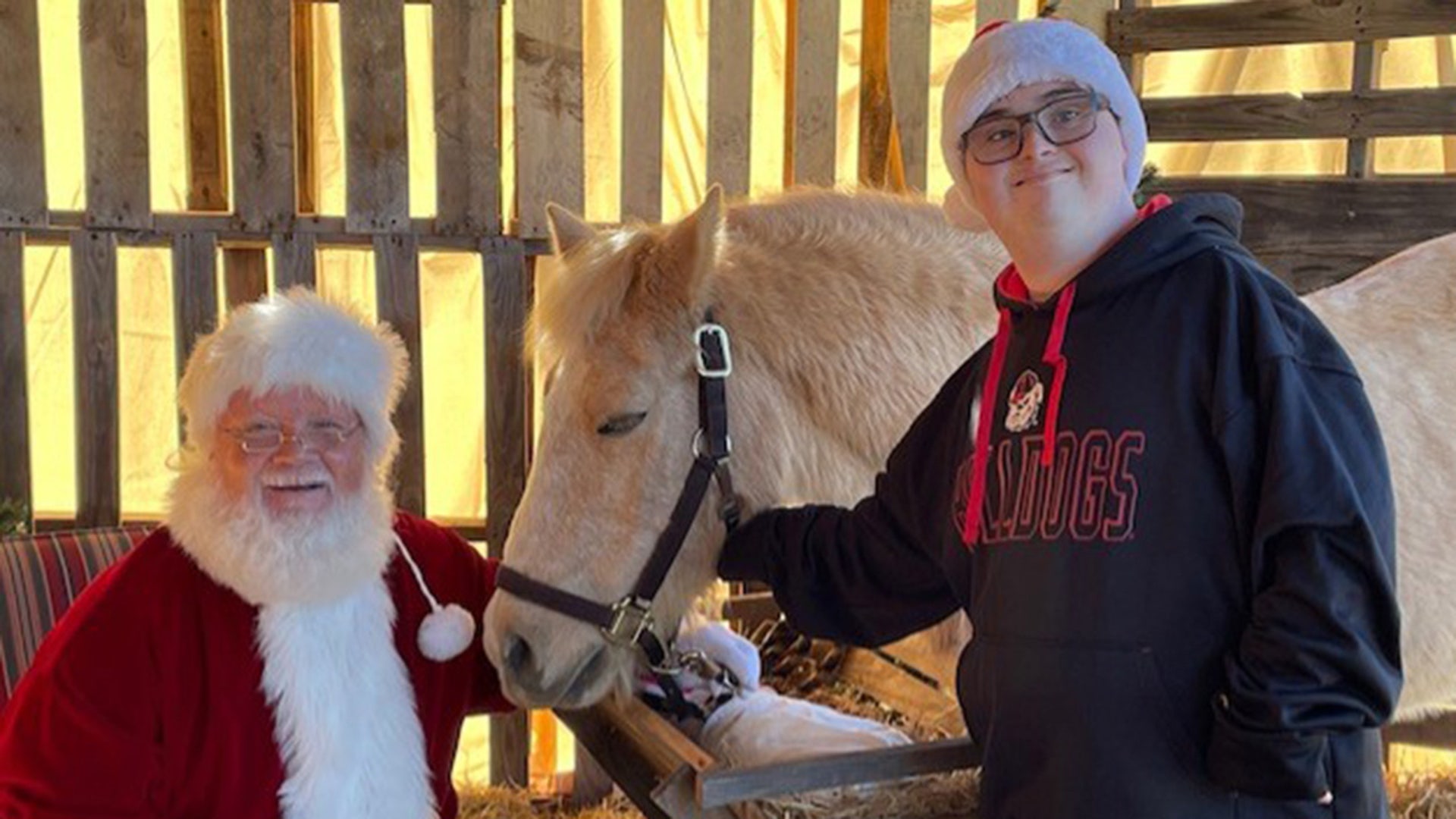 This is my child and he loves Christmas and Santa Claus!! Merry Christmas to all of Fox Family!!! The Evans Family