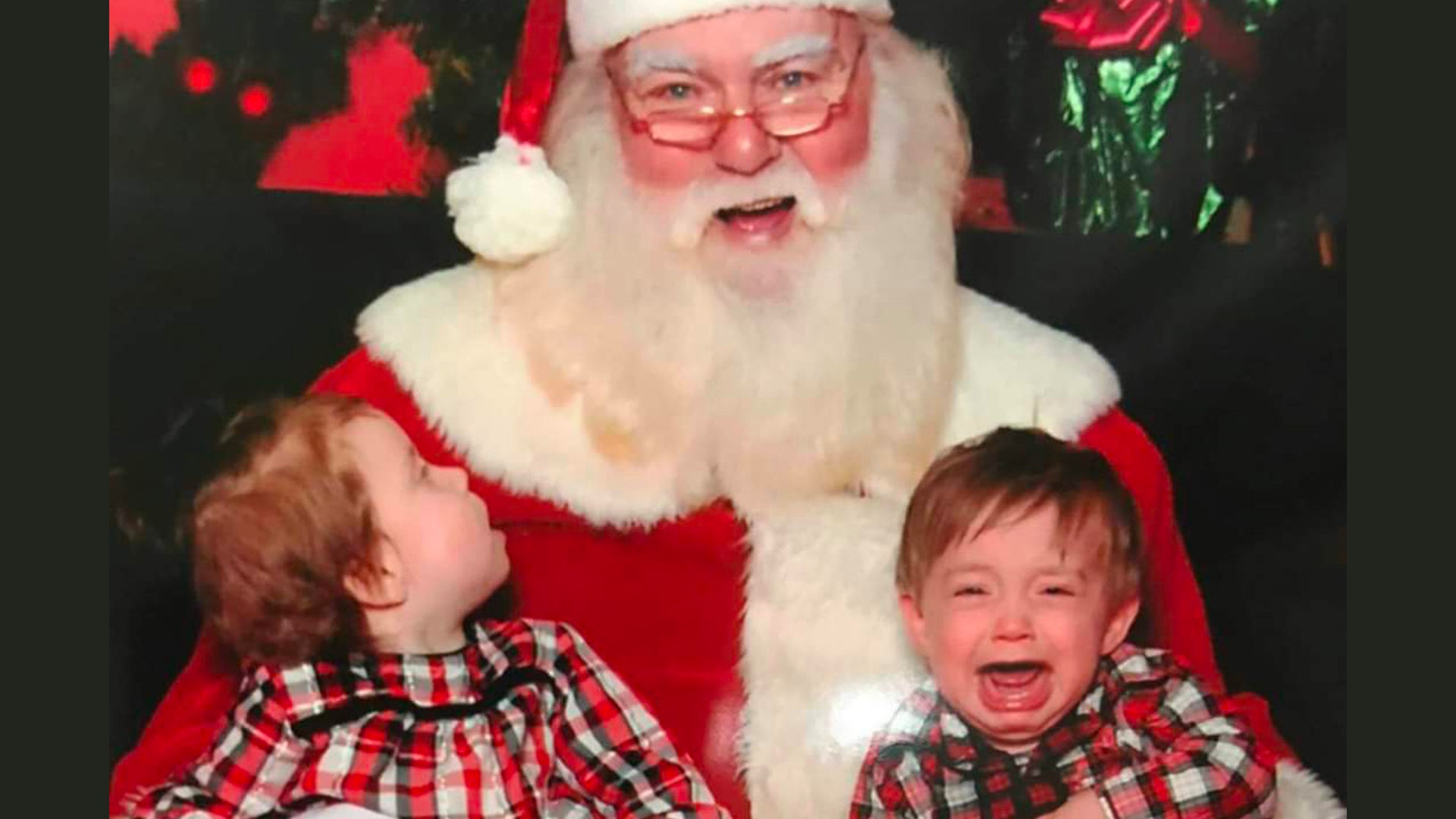 Peighton and Liam are twins but they certainly don't think alike. Peighton is quite taken by Santa whereas Liam wants someone to take him from Santa. Submitted by: Grandma Barnett