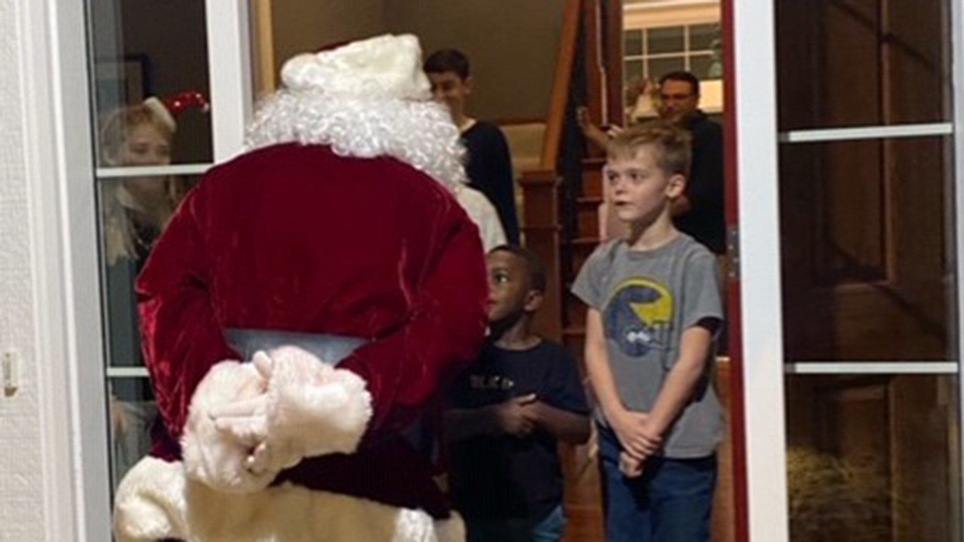 Our grandchildren were very excited and on their best behavior to see Santa standing at the door for an impromptu visit.