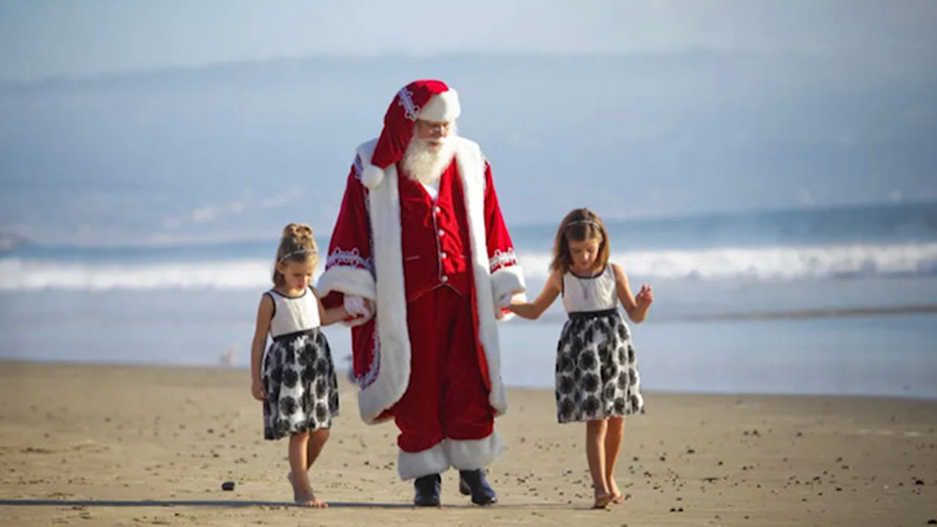 My having fun with Santa in the Sand picture shoot.