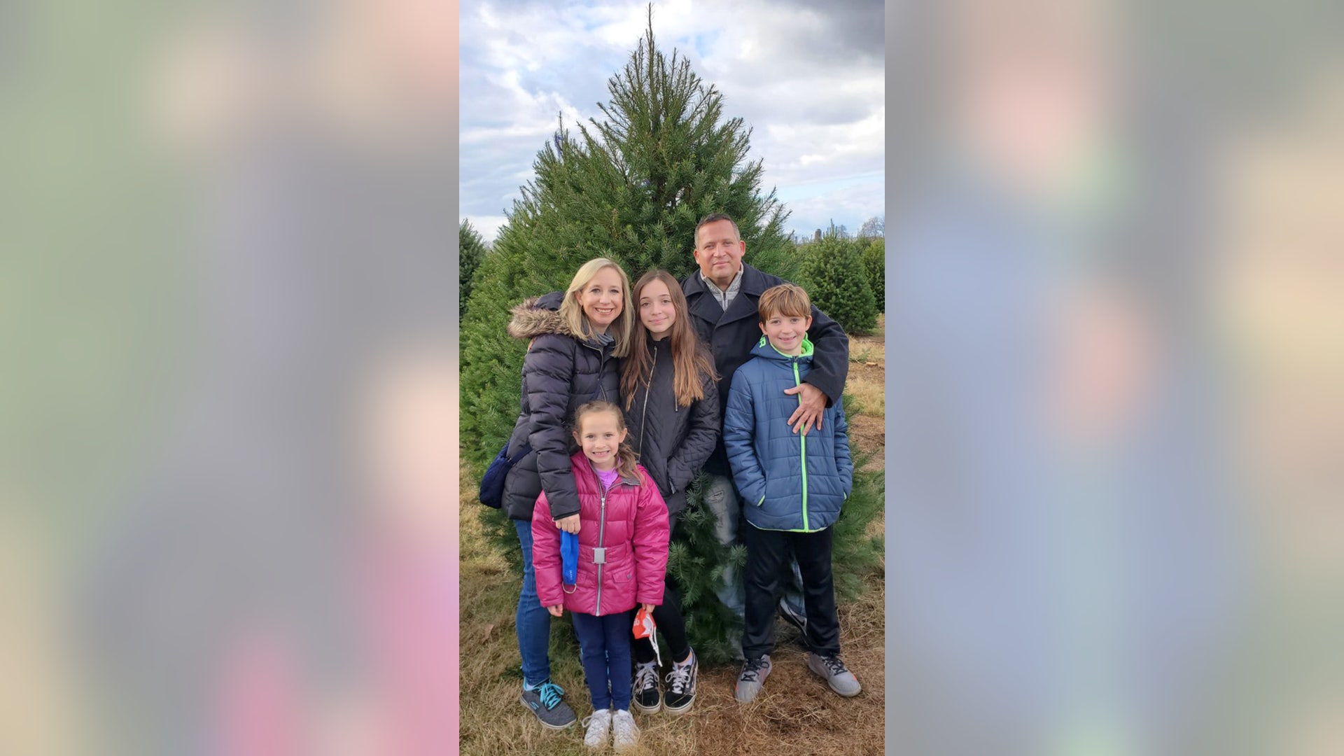 Here is our family having some social distancing fun cutting down our own tree at a NJ tree