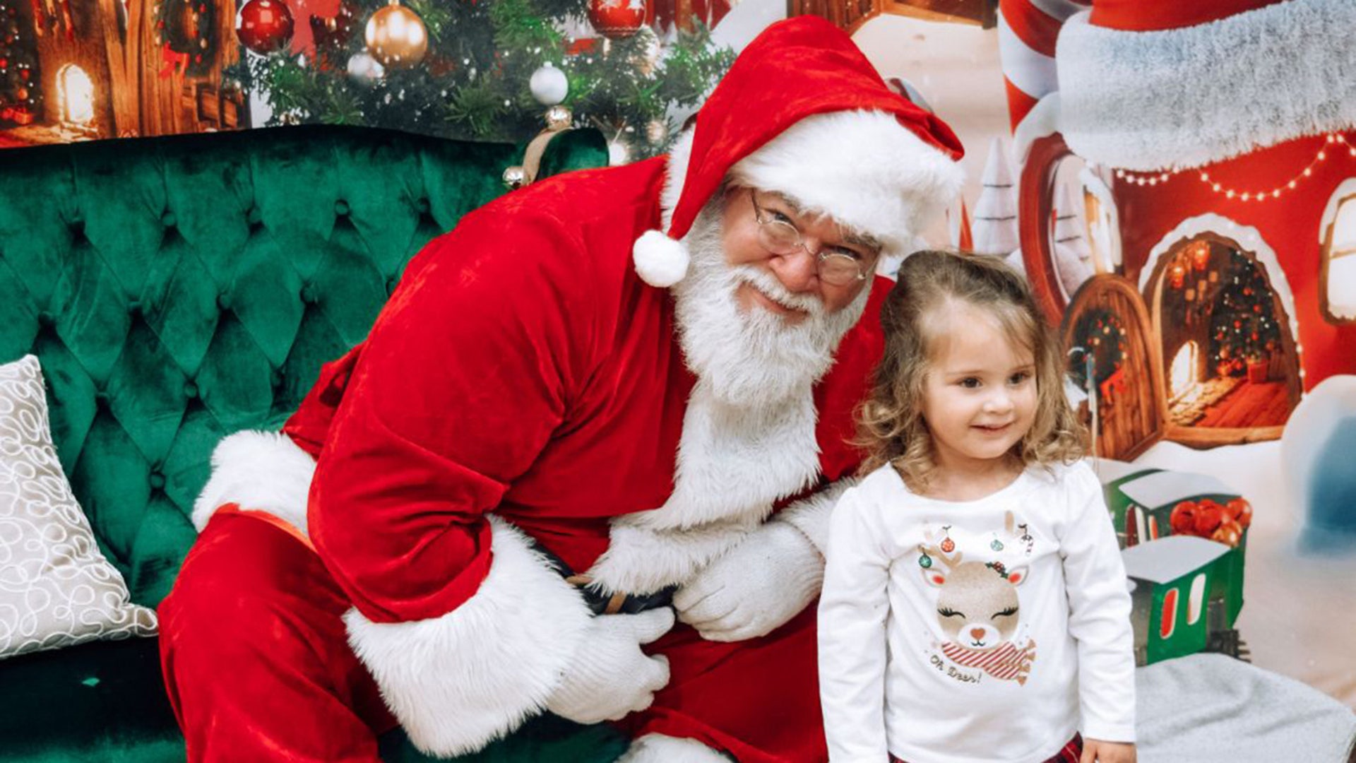 This is my 2 year old granddaughter Nyla seeing Santa this year. We are from Indiana, Nyla loves the holidays and is hoping for snow and lots of toys!