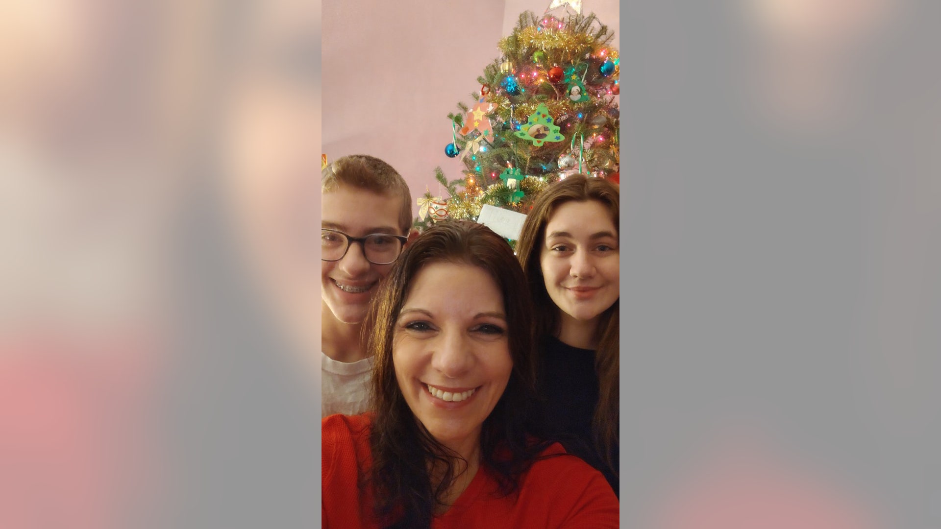 Good Morning, We want to say Merry Christmas to all of you. We are big supporters including my son, Jesse and daughter, Alora. Unfortunately, Matilda was not too sure of the Christmas hat and did not want to join our group picture, but she watches you too!! Take care, Tabatha Kelly