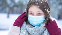 Don't replace coronavirus face masks with scarves, experts warn